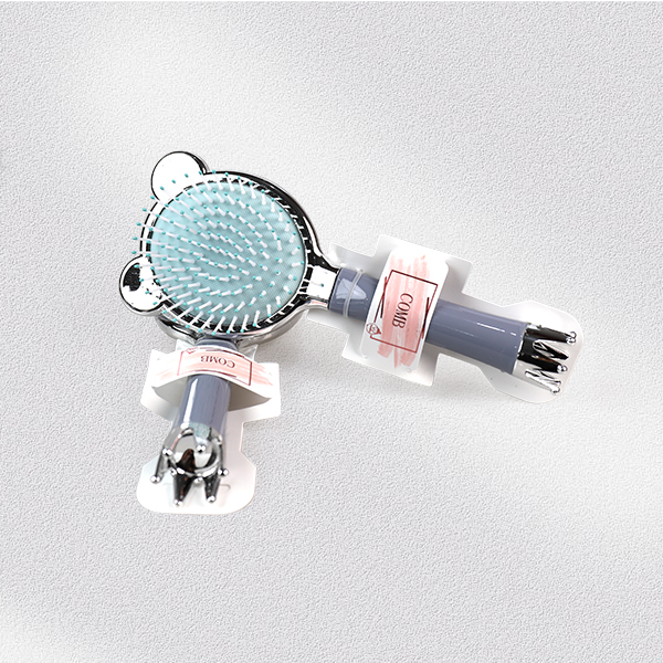 Silver-plated bear cushion comb