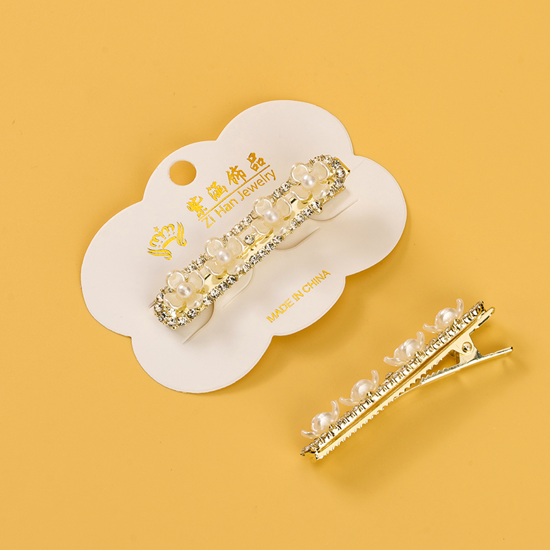 New four rhinestone camellia duck clip