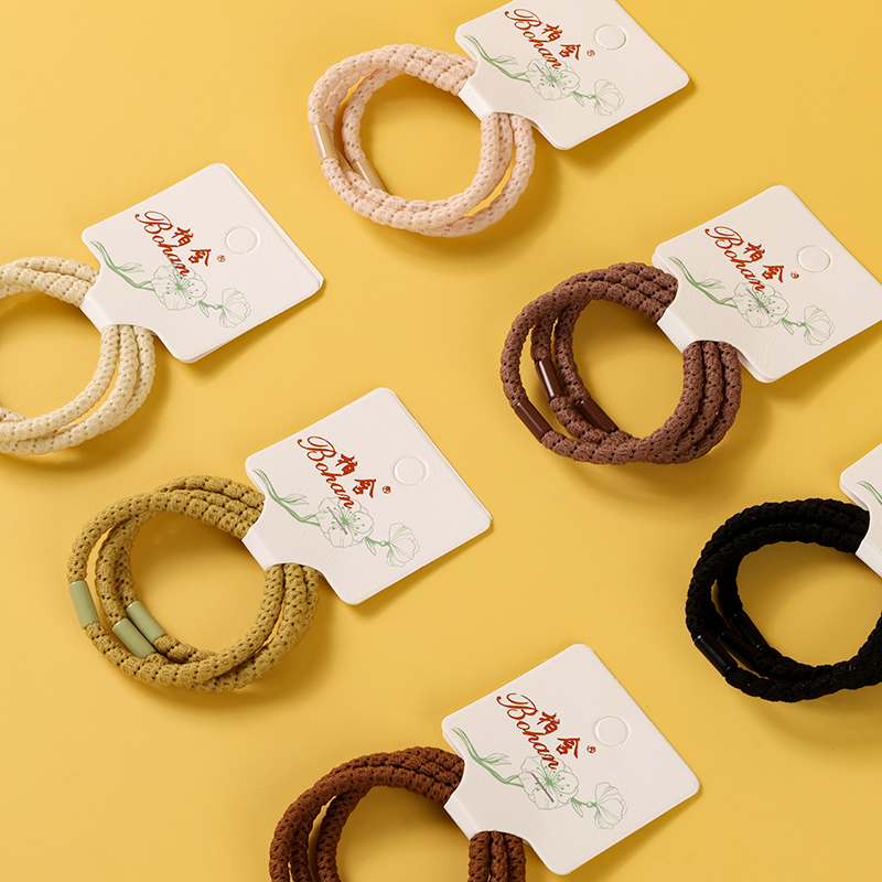 Three colored light board rubber bands