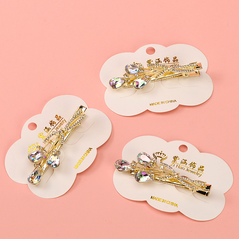 Bag of three zircon flower duck clip