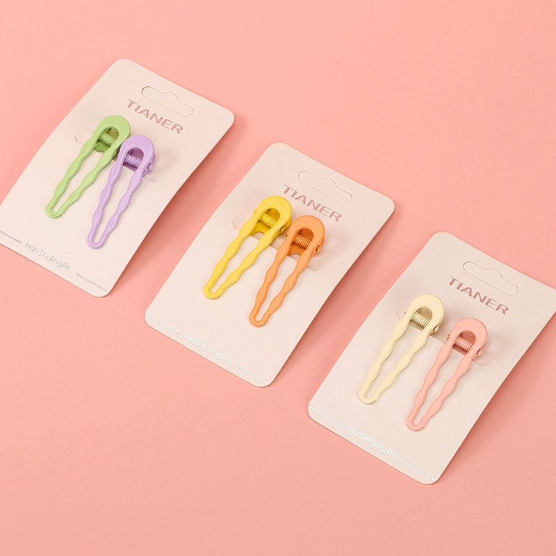 Bagged color hollow shape pair duck clip