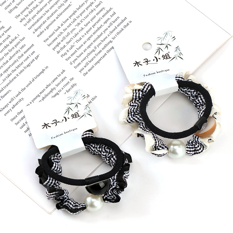 Two pearl lace accessories rubber bands