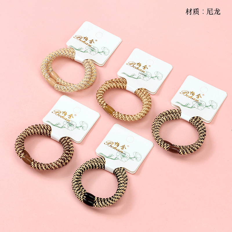 Two brown gold wire high elastic rubber bands