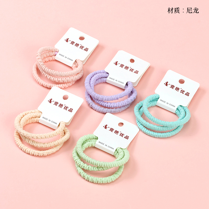 Three wrinkled colored rubber bands