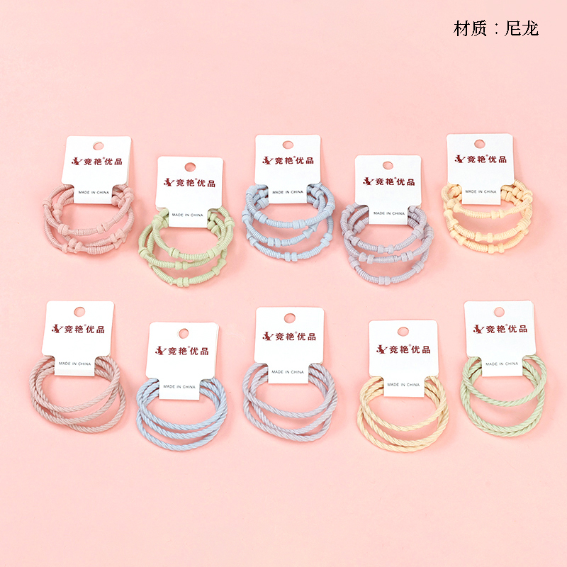 Boxed three colored rubber bands (random)