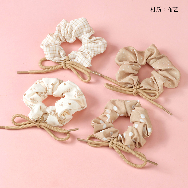 Boxed brown print tie-knot large intestine ring