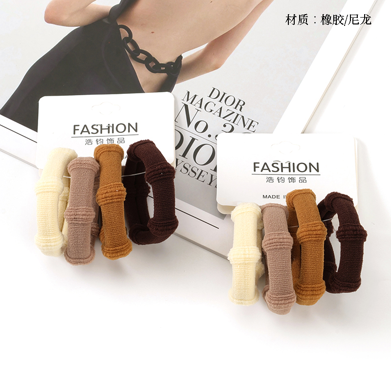 Four milk tea-colored bamboo elevator rubber bands