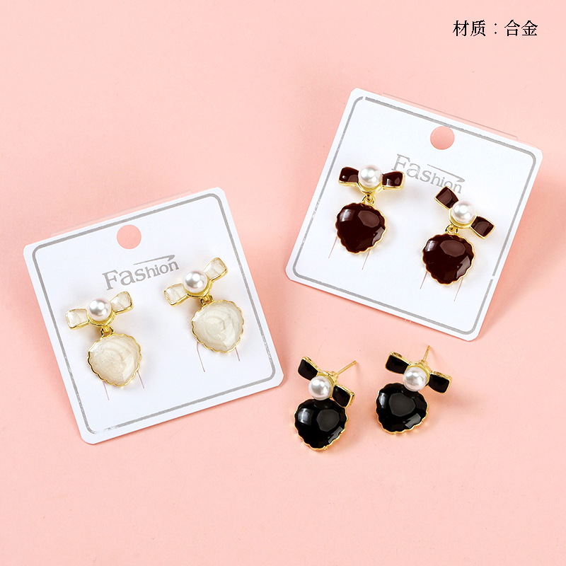 Long Bow Dropping Peach Heart Earrings