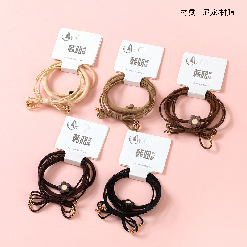 brown bow tie bead combination rubber band