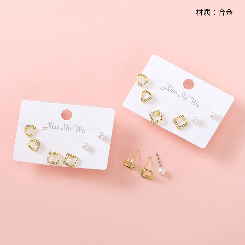 Three pairs of rhinestone pearl stud earrings