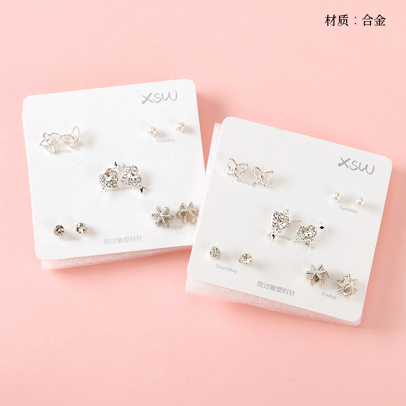 Five pairs of rhinestone pearl stud earrings