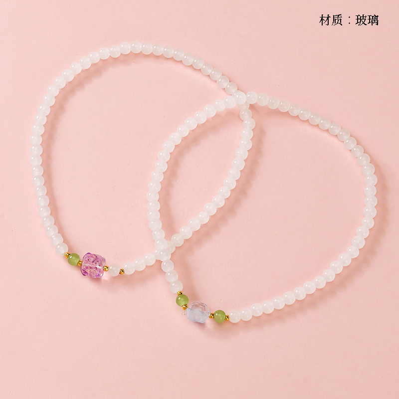 Two circles of white jade lion bracelet