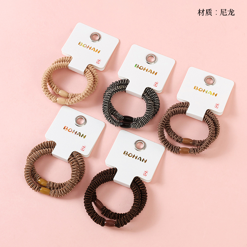 Boxed Two brown Simple Pleated Rubber Tendons