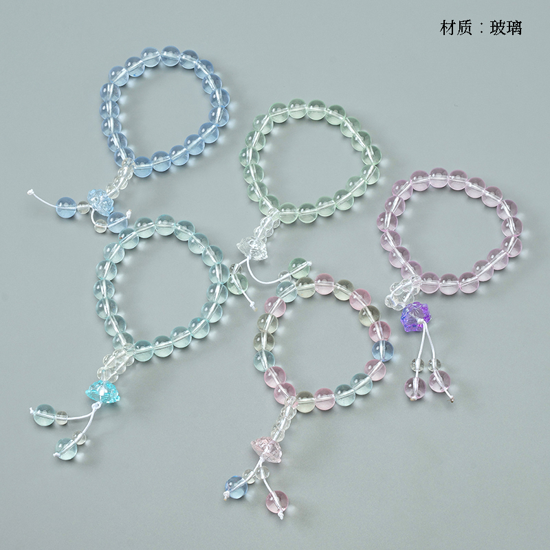 Small clear lotus tassel bracelet