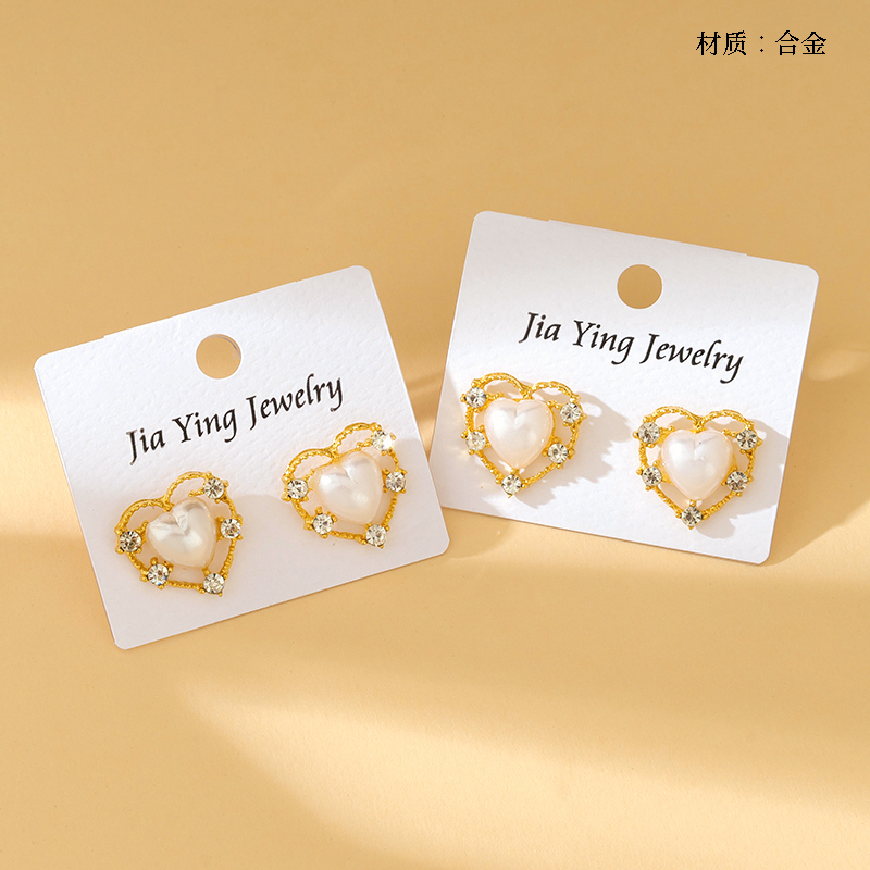 Long point drill peach heart earrings