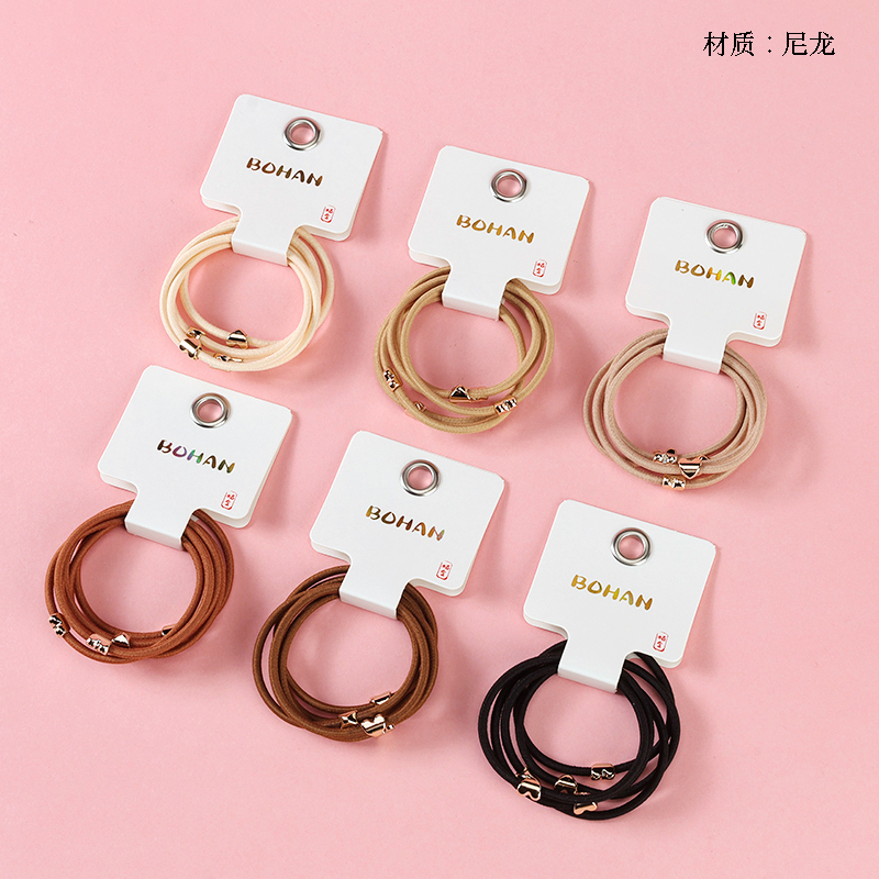 Boxed five brown love accessories rubber band