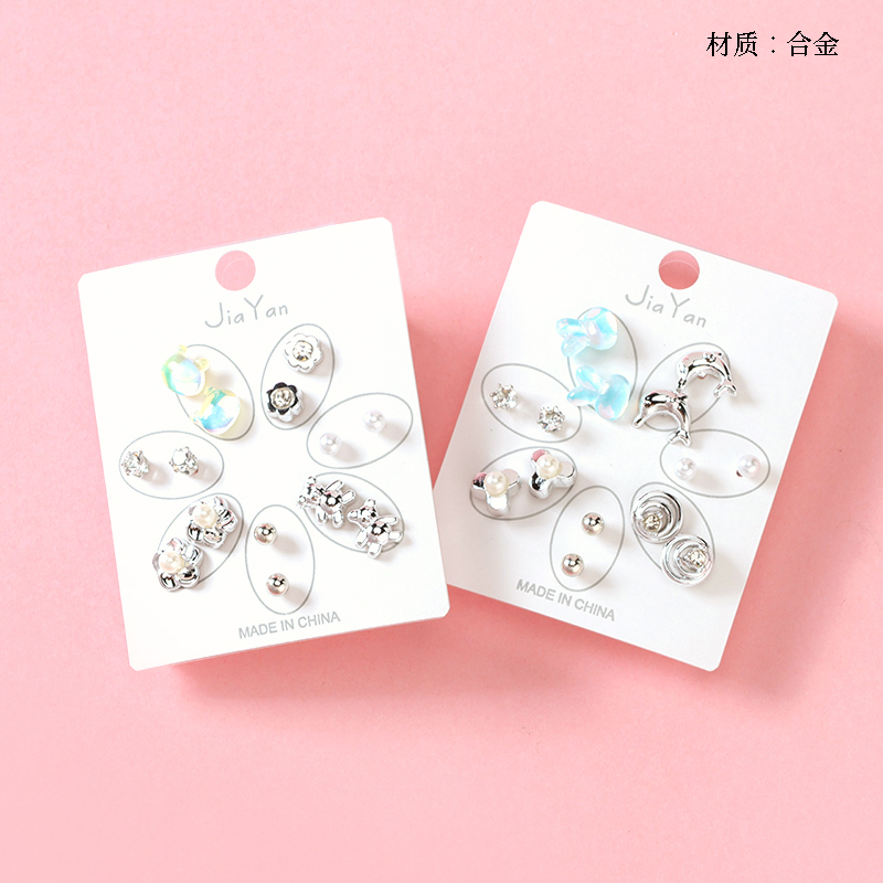 Seven pairs of new silver style stud earrings