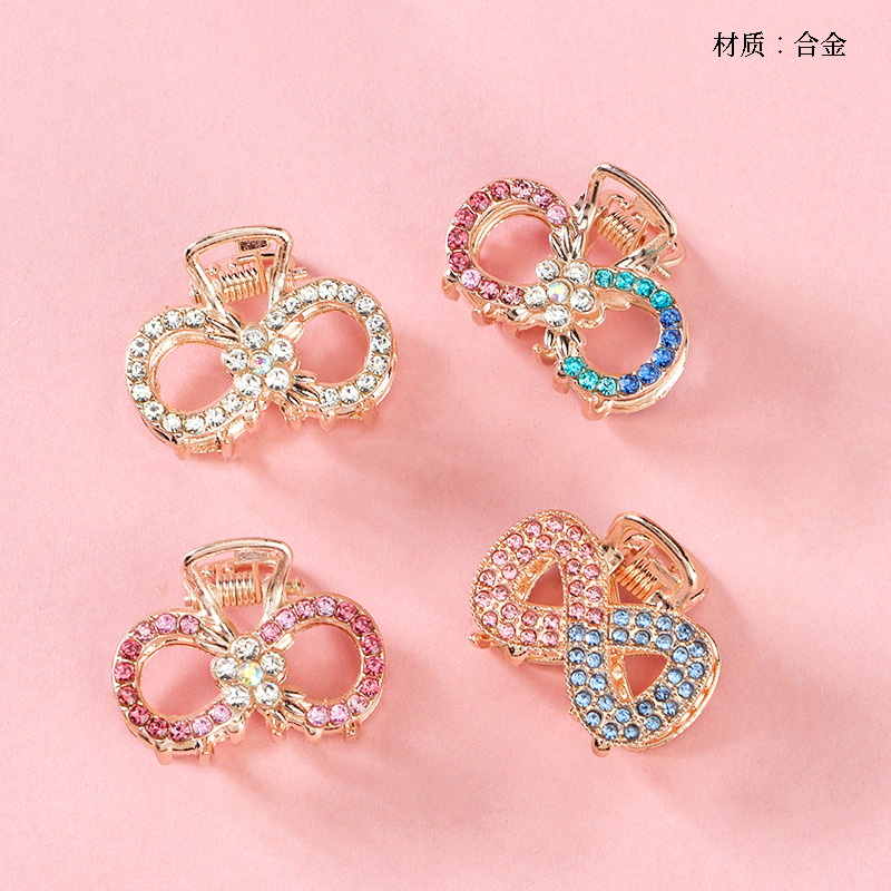 Bow tie colored diamond claw