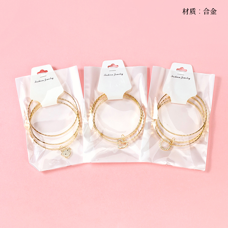 Golden Diamond Pendant Bracelet (3 rings)