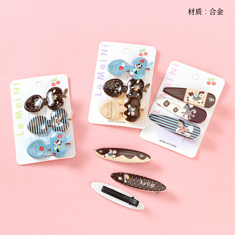 Boxed three cartoon print style duck clip