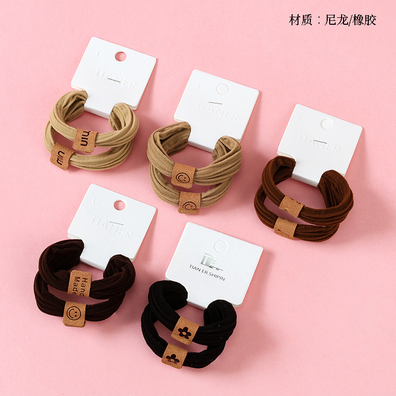 2 milk tea color cartoon labeled rubber bands