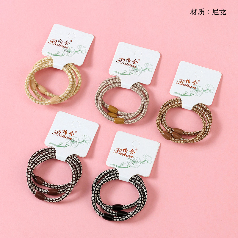 Three milk tea-colored check bands