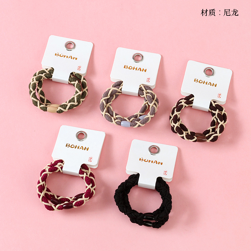 Boxed three dark twist rubber bands