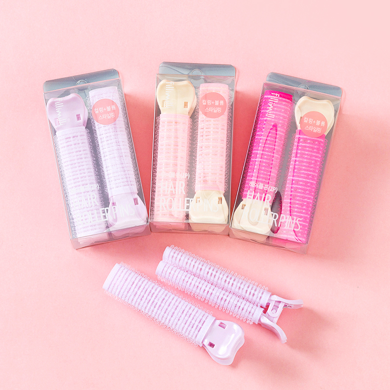 Two boxed fluffy clips