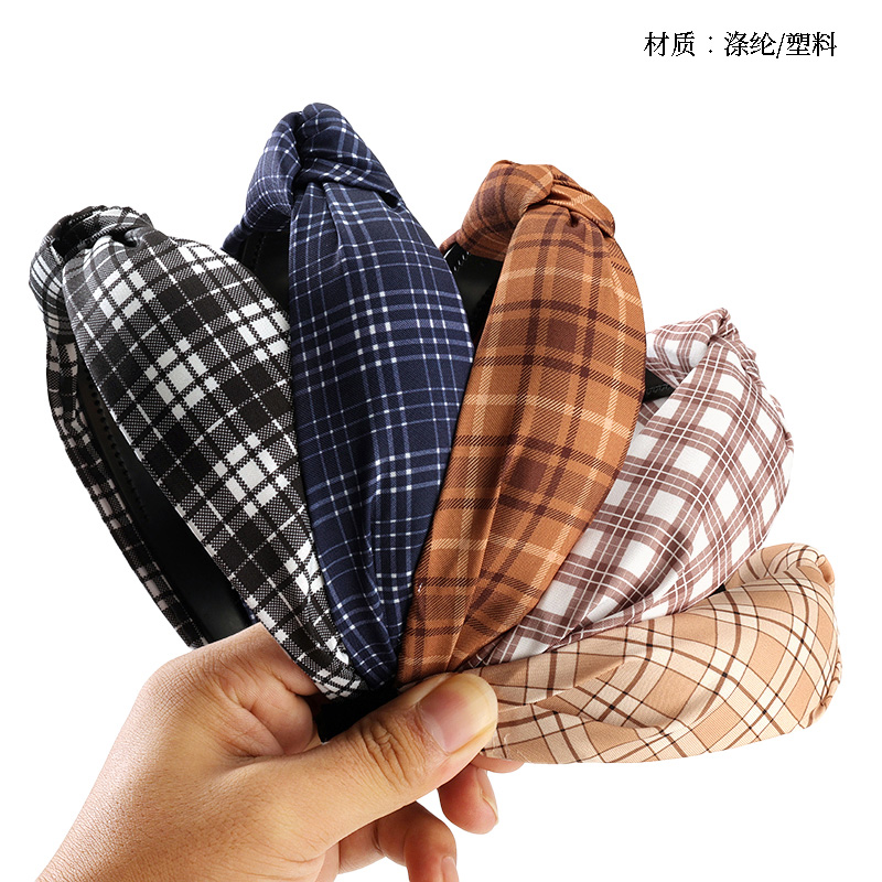 Wide-net knotted check buckle