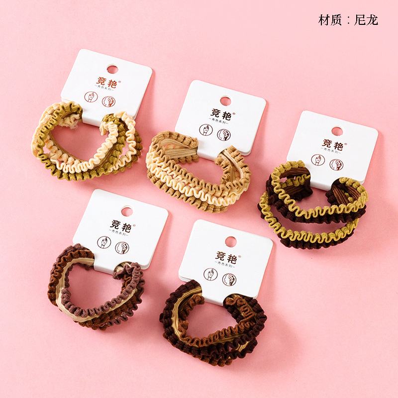 Two wooden ears with high elastic rubber bands