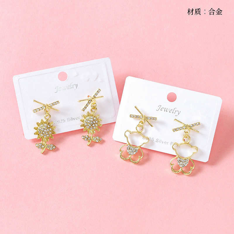 Long cross rhinestone stud earrings