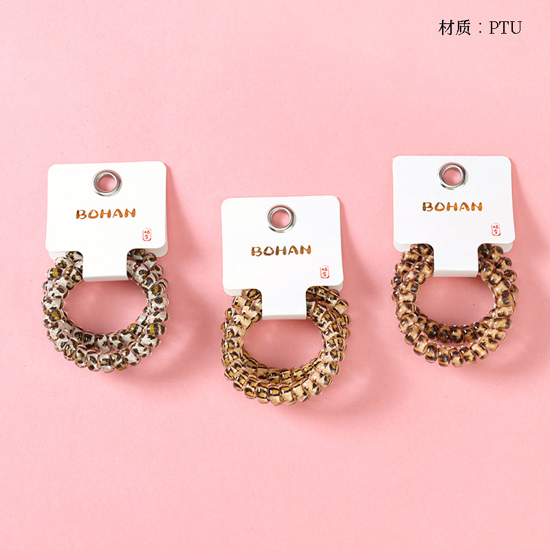 Boxed two leopard-print phone lines