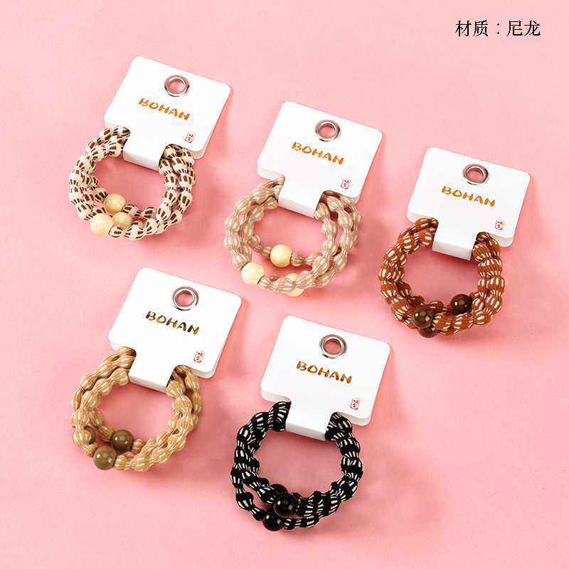 Boxed three milk tea colored beanie bands