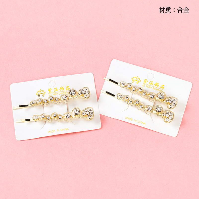 Bagged rhinestone peach heart clip