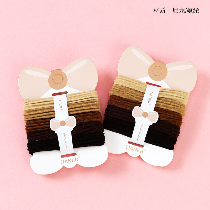 Boxed five milk tea colored high stretch rubber bands