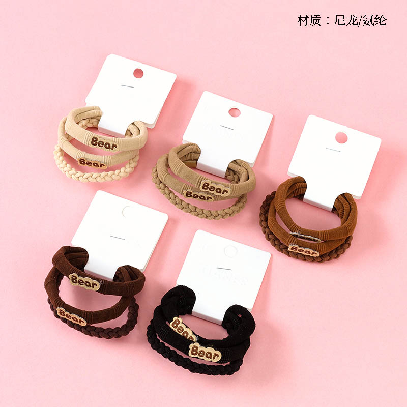 Three cream-colored pigtail bands