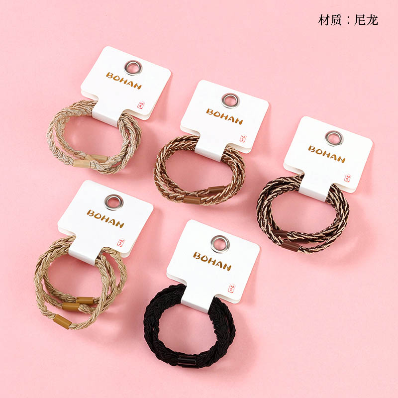 Boxed three curry color flat braid rubber band