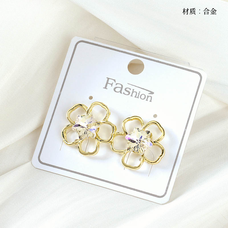 Long hollow zircon flower stud earrings