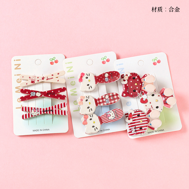 Boxed three red KT cat print duck clip