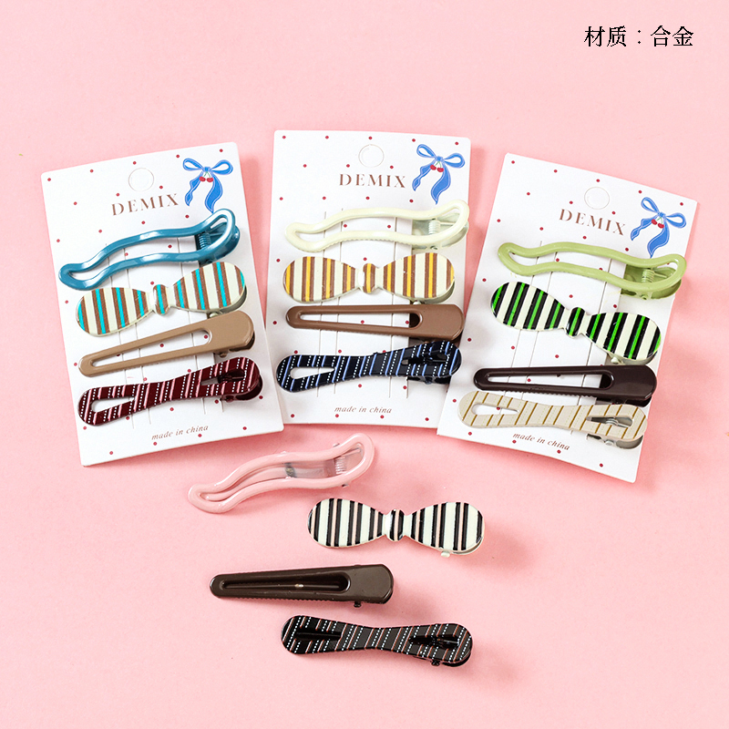 Boxed Four Oil Drop Stripe Style Duck Clip