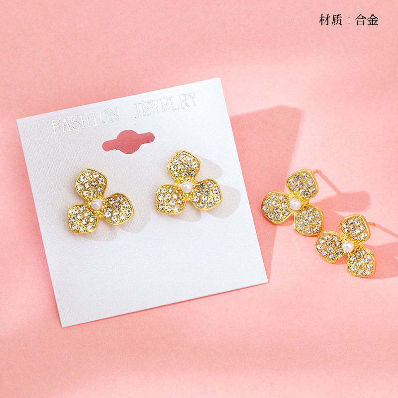 Full drill three-petal golden flower earrings