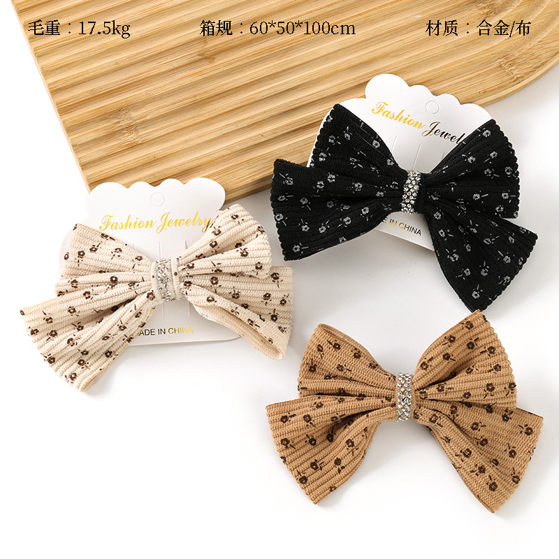 Boxed Flocking Rhinestone Bow-tie Duck Clip