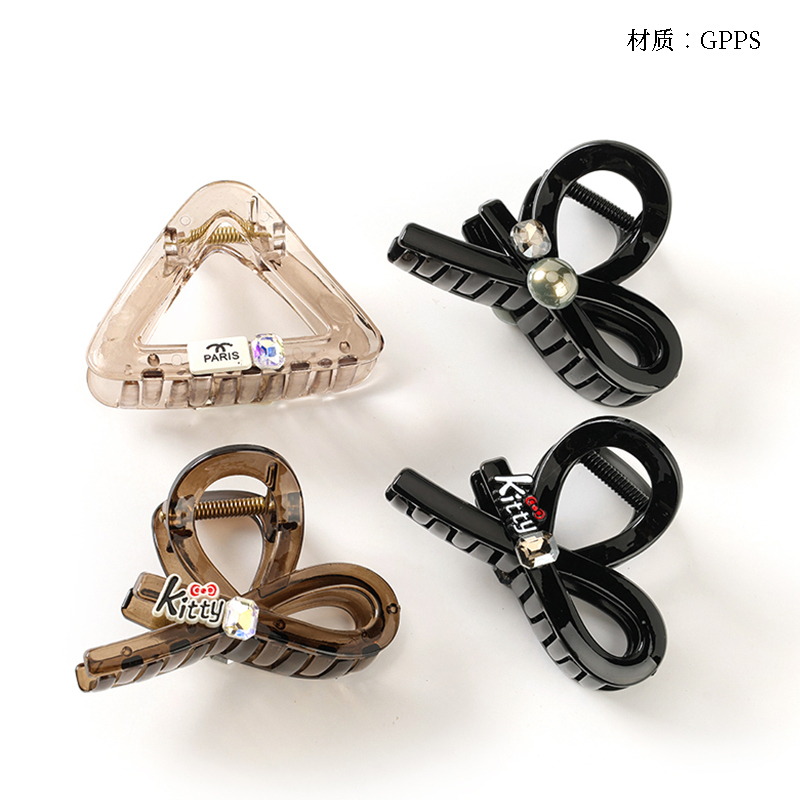 Boxed black brown accessories in the claw (8cm)