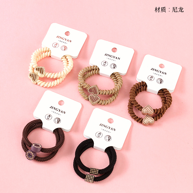 Boxed two curry color diamond accessories rubber band