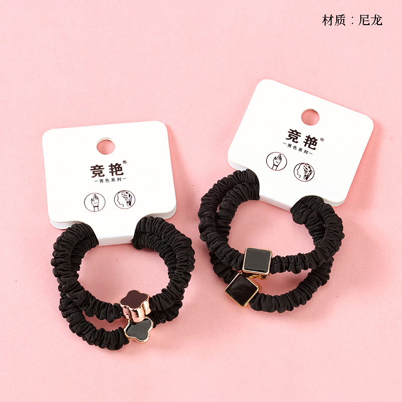 Boxed two black oil drop accessories rubber band