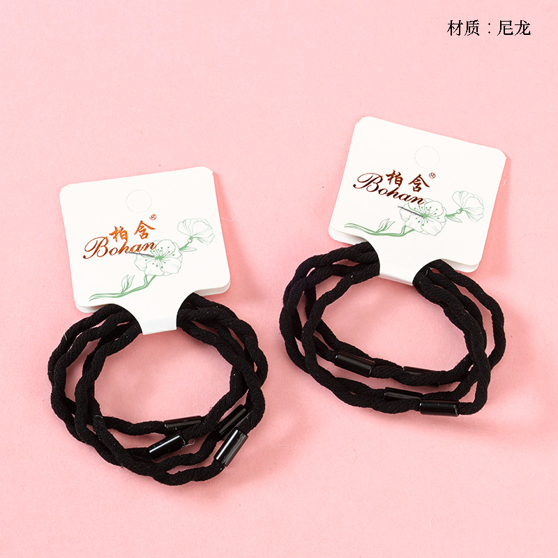 Boxed four wave black rubber bands