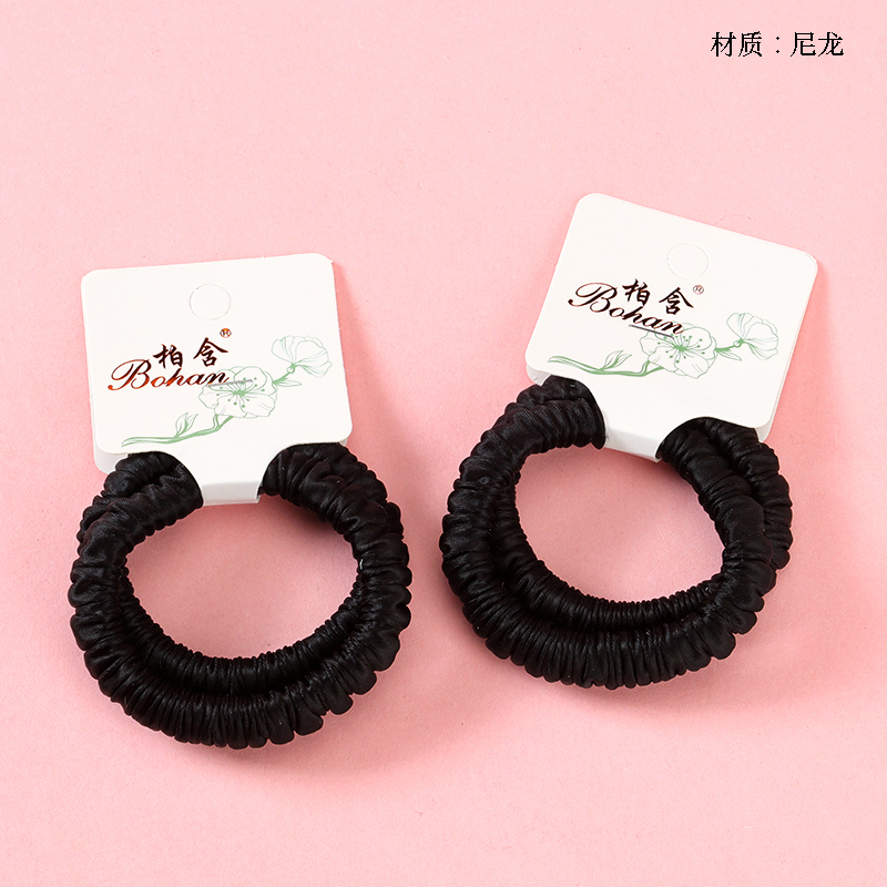 Boxed two black super soft rubber bands