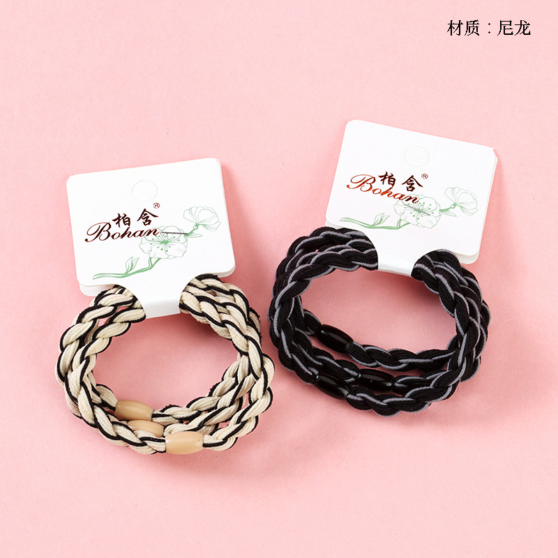 Boxed three striped twisted rubber bands