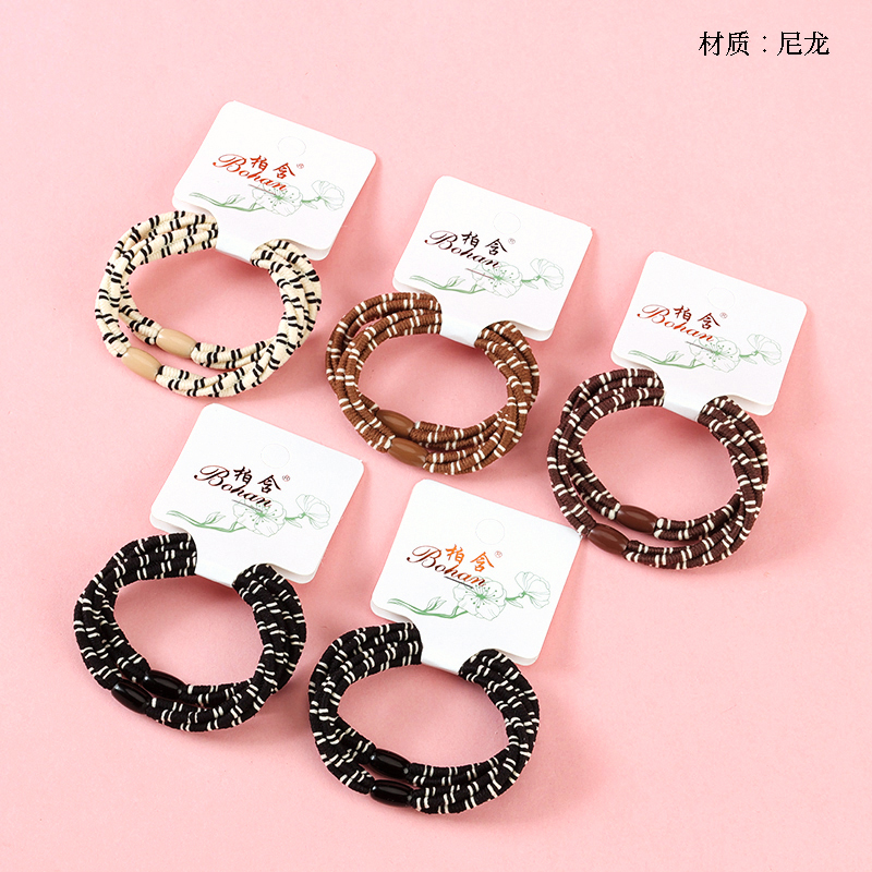 Boxed two vertical stripes with rubber bands