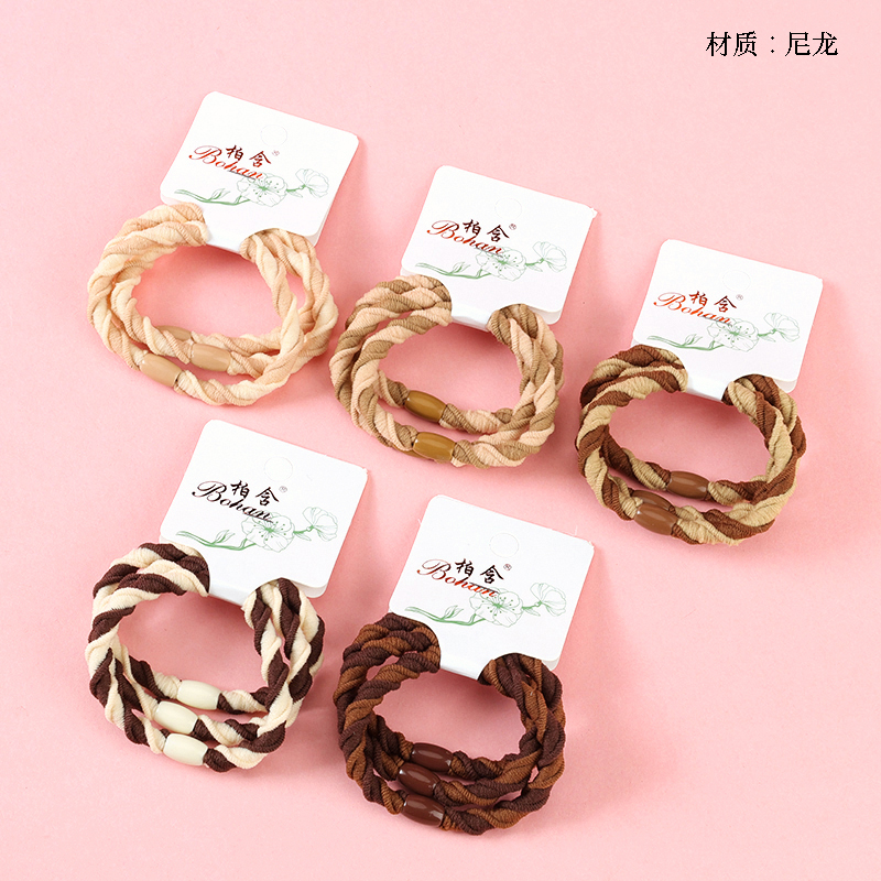 Boxed three curry color high elastic spiral rubber bands